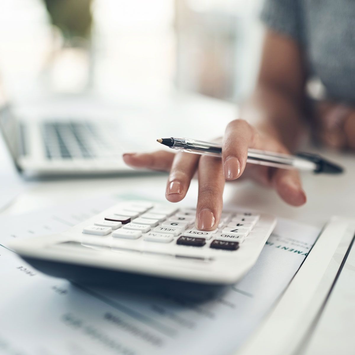 Payroll professional in Draper, Utah, helping process payroll for a business.