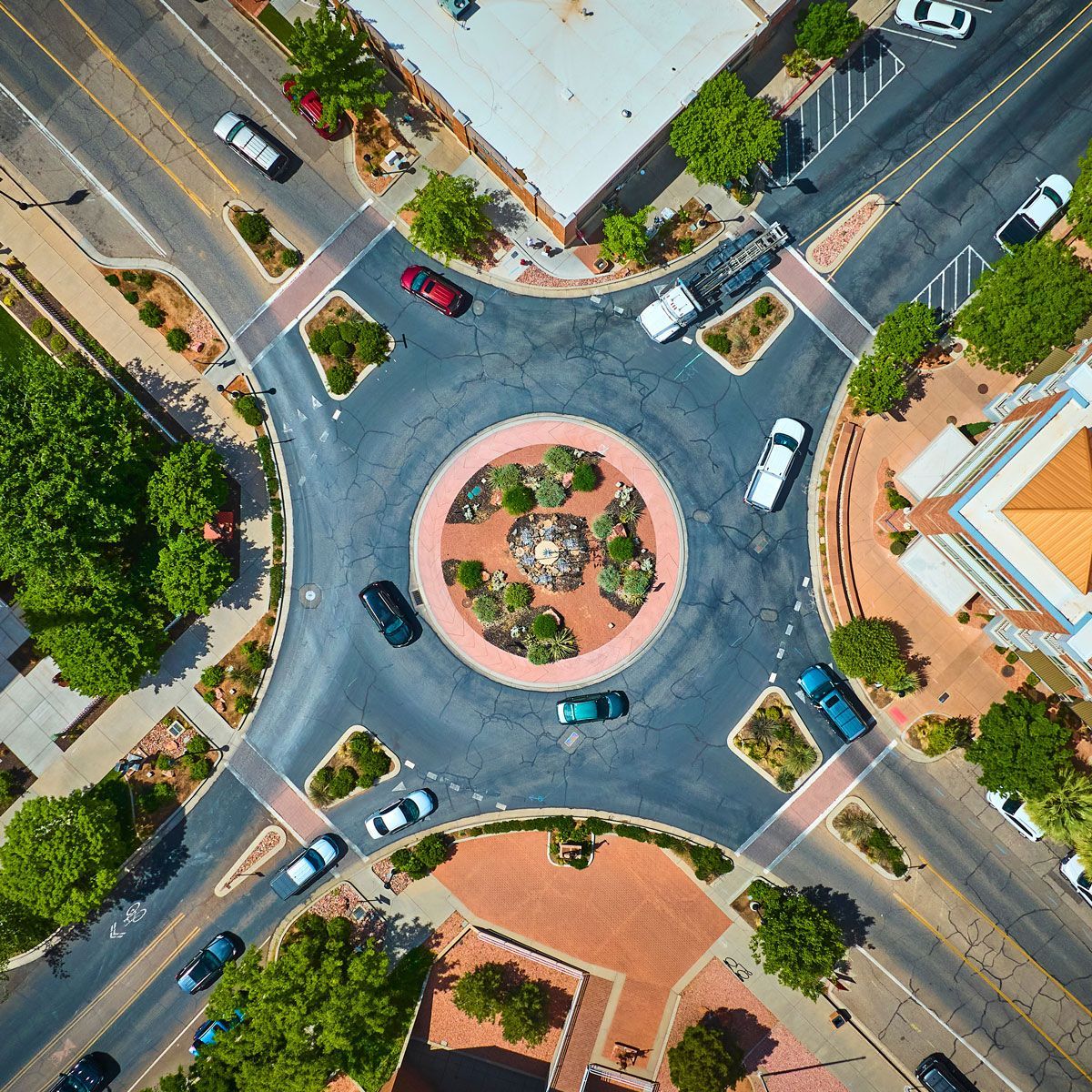 Aerial view of a landscaped roundabout in a Southern Utah business district