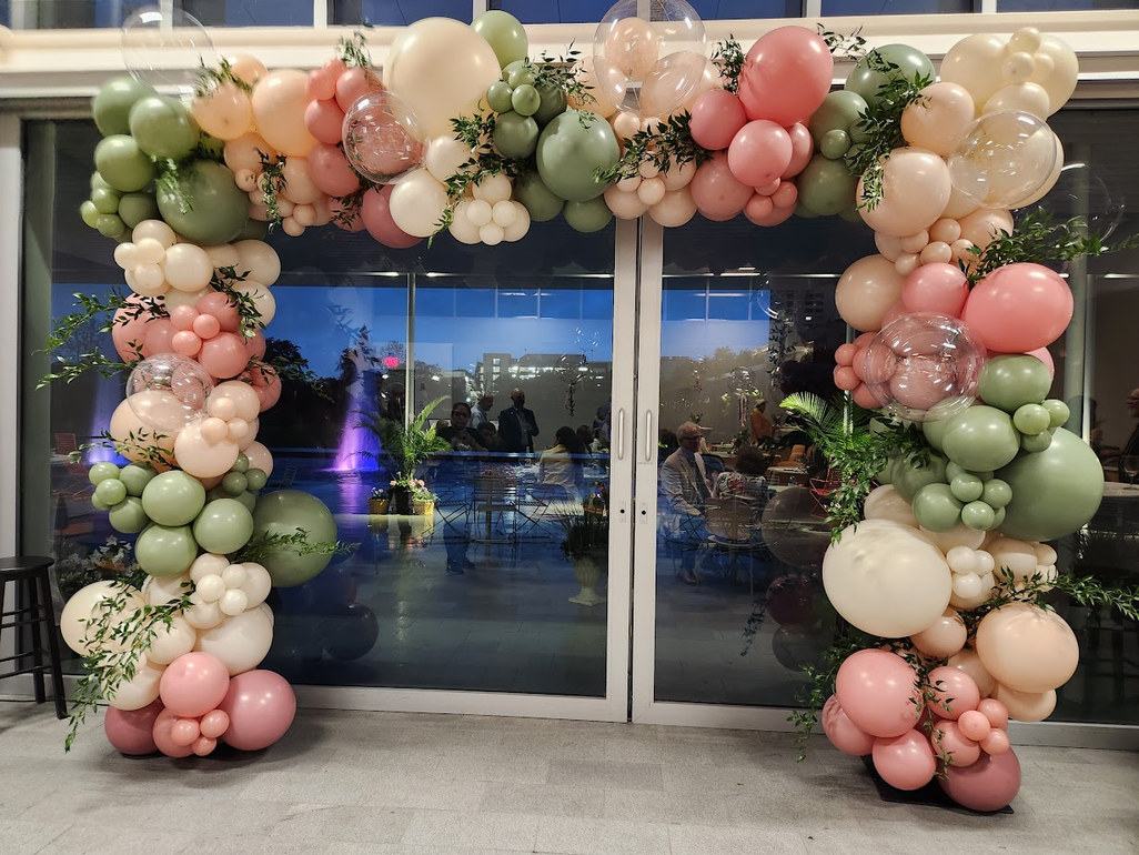 Giant custom balloon sculpture installation at an event venue