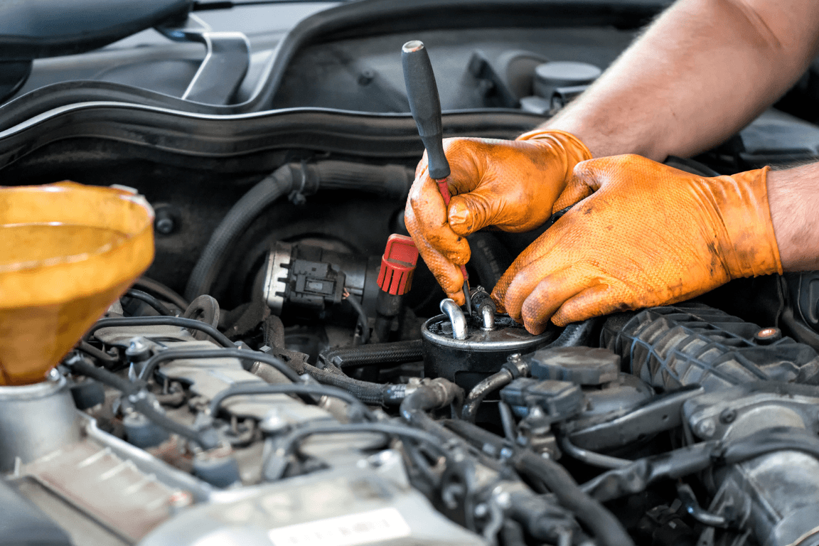 a mechanic doing an auto repair on-site