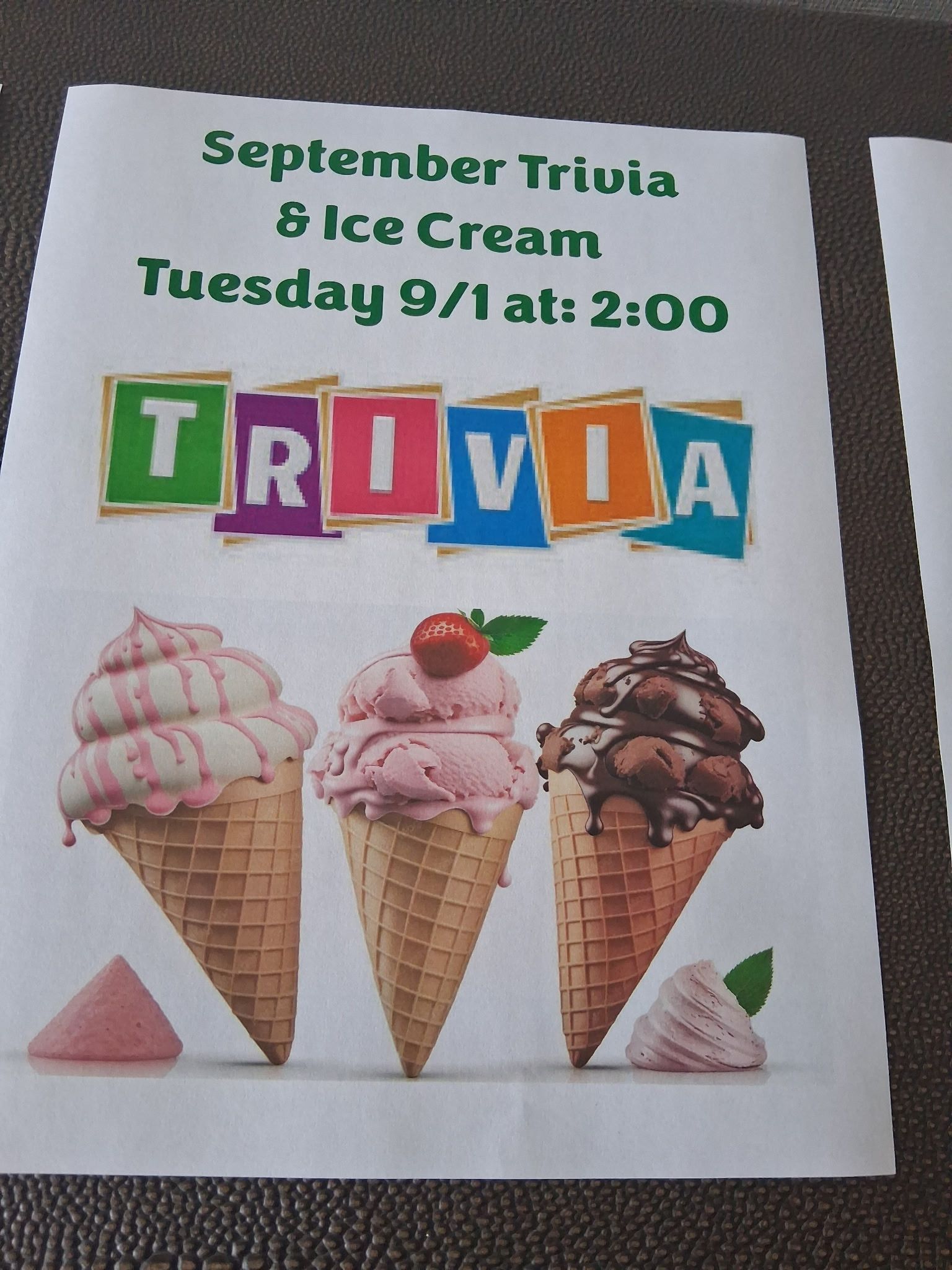 September Trivia & ice cream Tuesday 9/1 at 2:00, with colorful letters and three ice cream cones