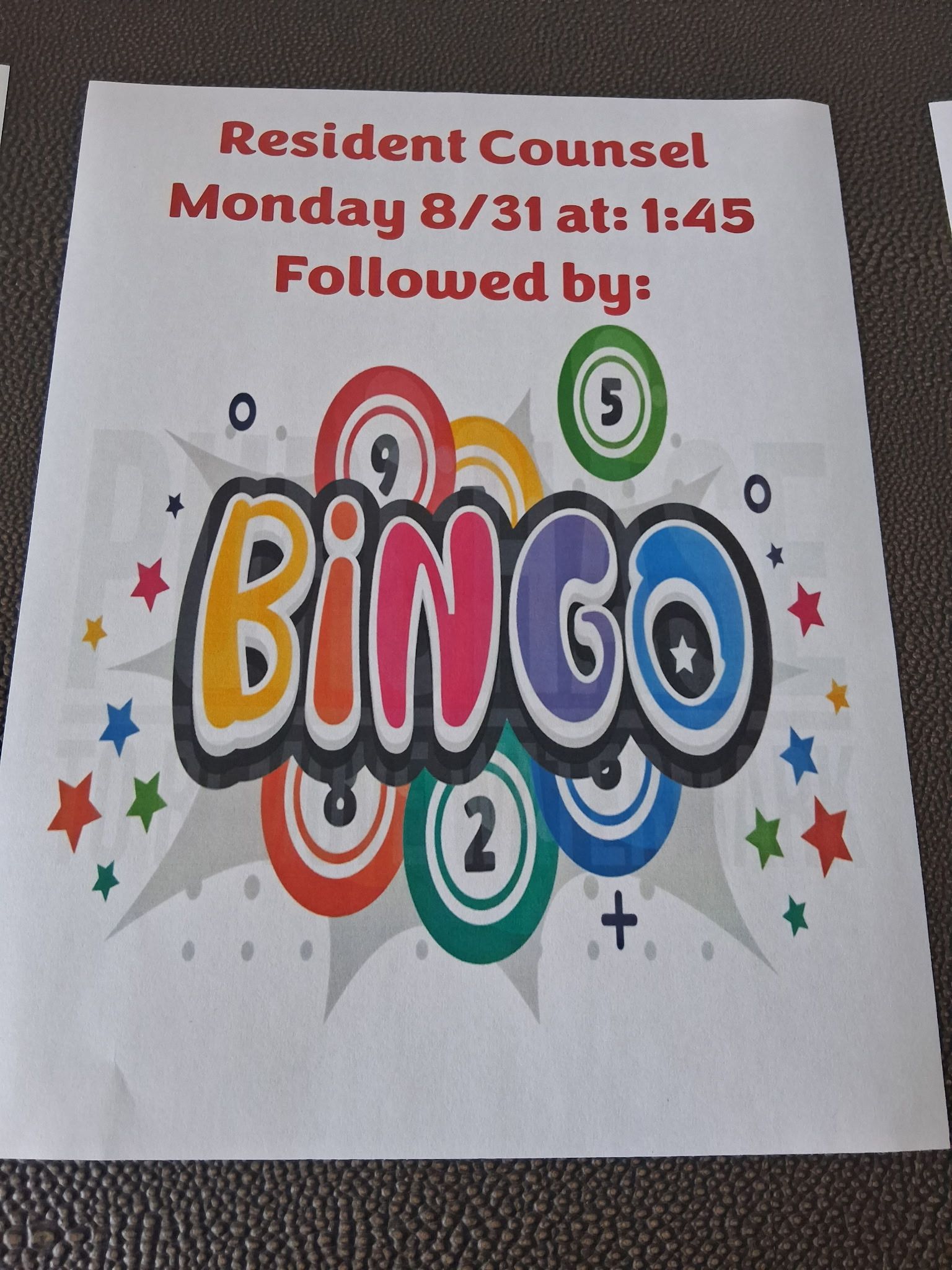 Flyer for Resident Council Monday 8/31 at 1:45 followed by bingo, with colorful bingo balls and stars