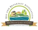 Michigan Lake to Lake Bed and Breakfast Association logo with stylized landscape and web address