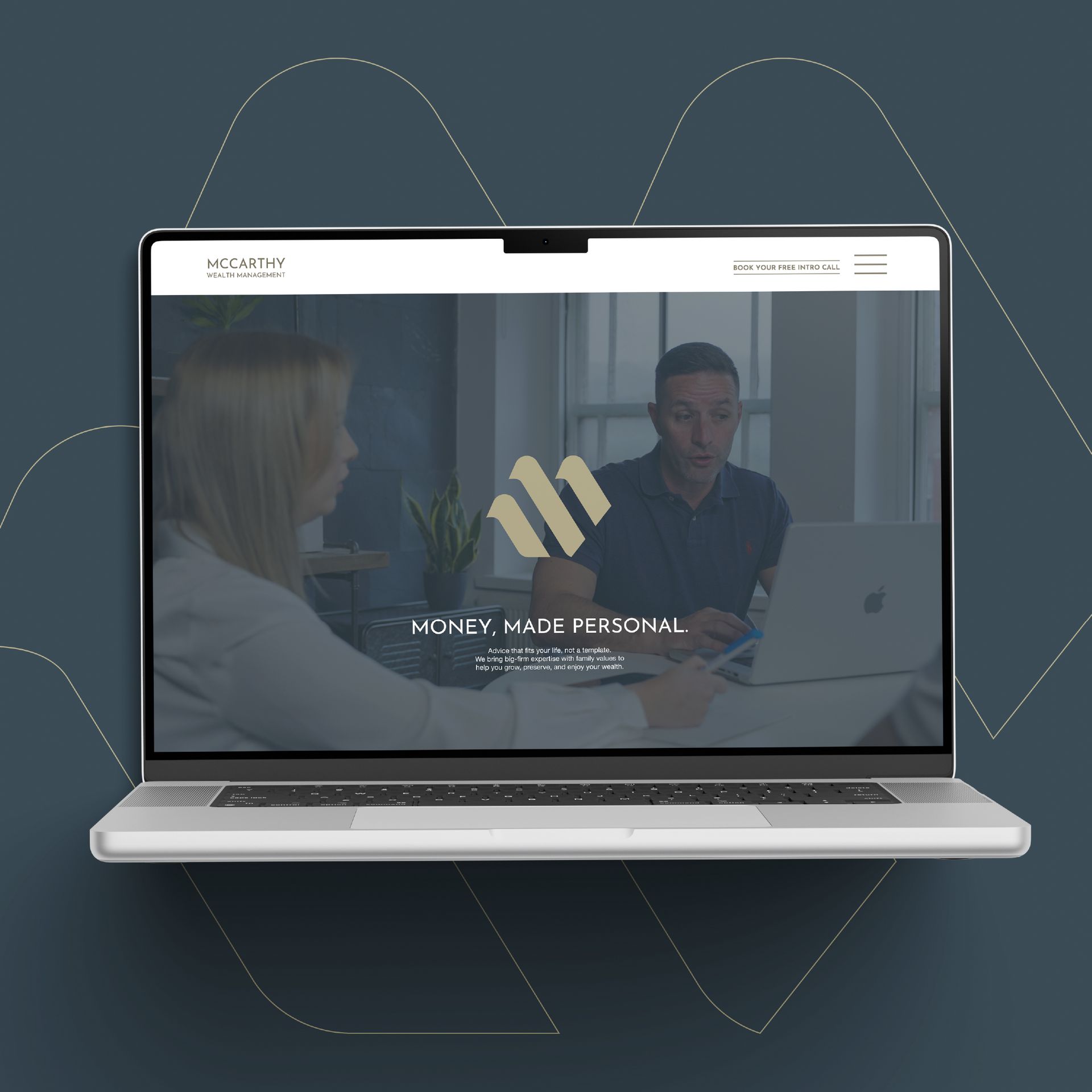 Laptop displaying a financial website with two people at a desk.
