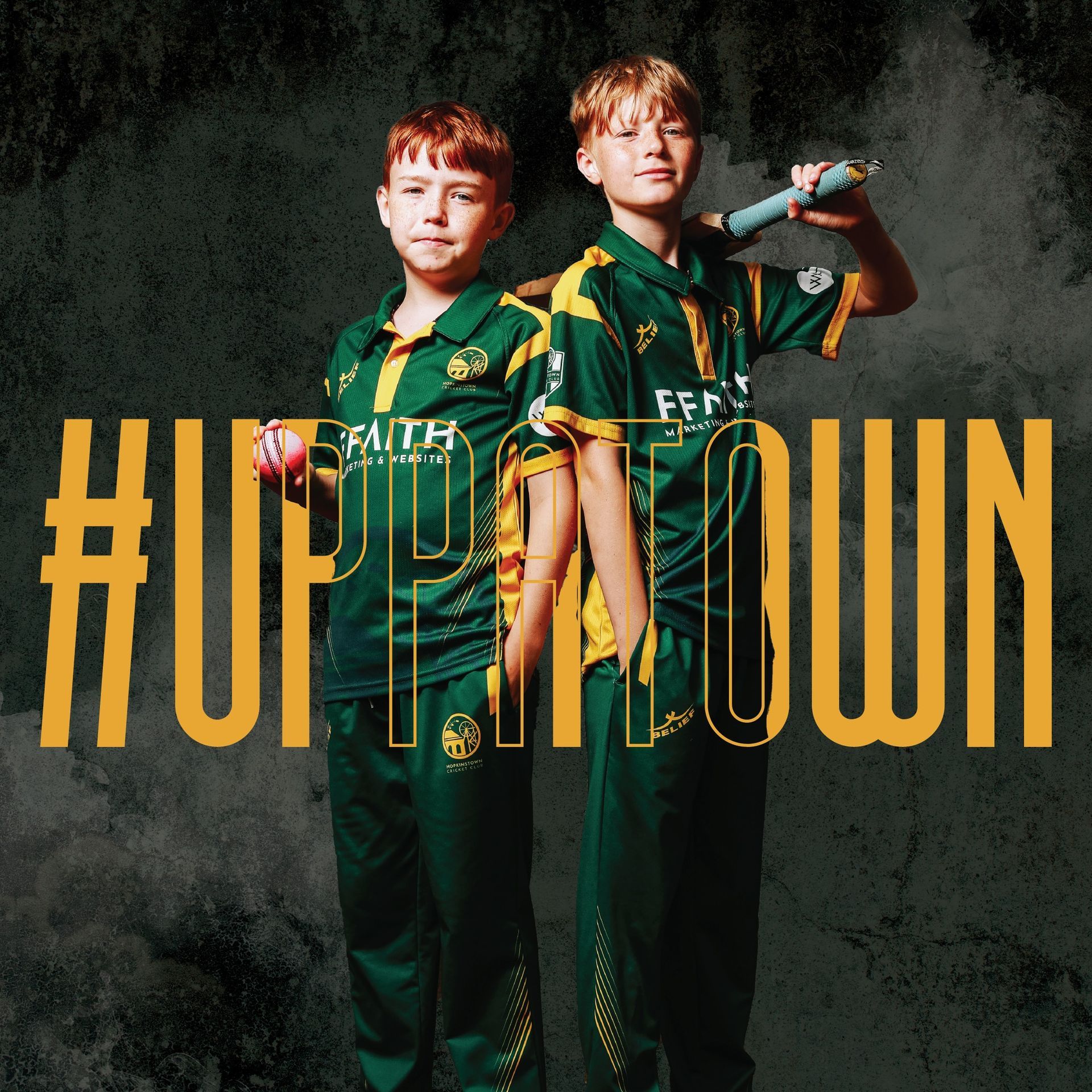 Two boys in green and gold cricket uniforms pose with equipment against a smokey background,