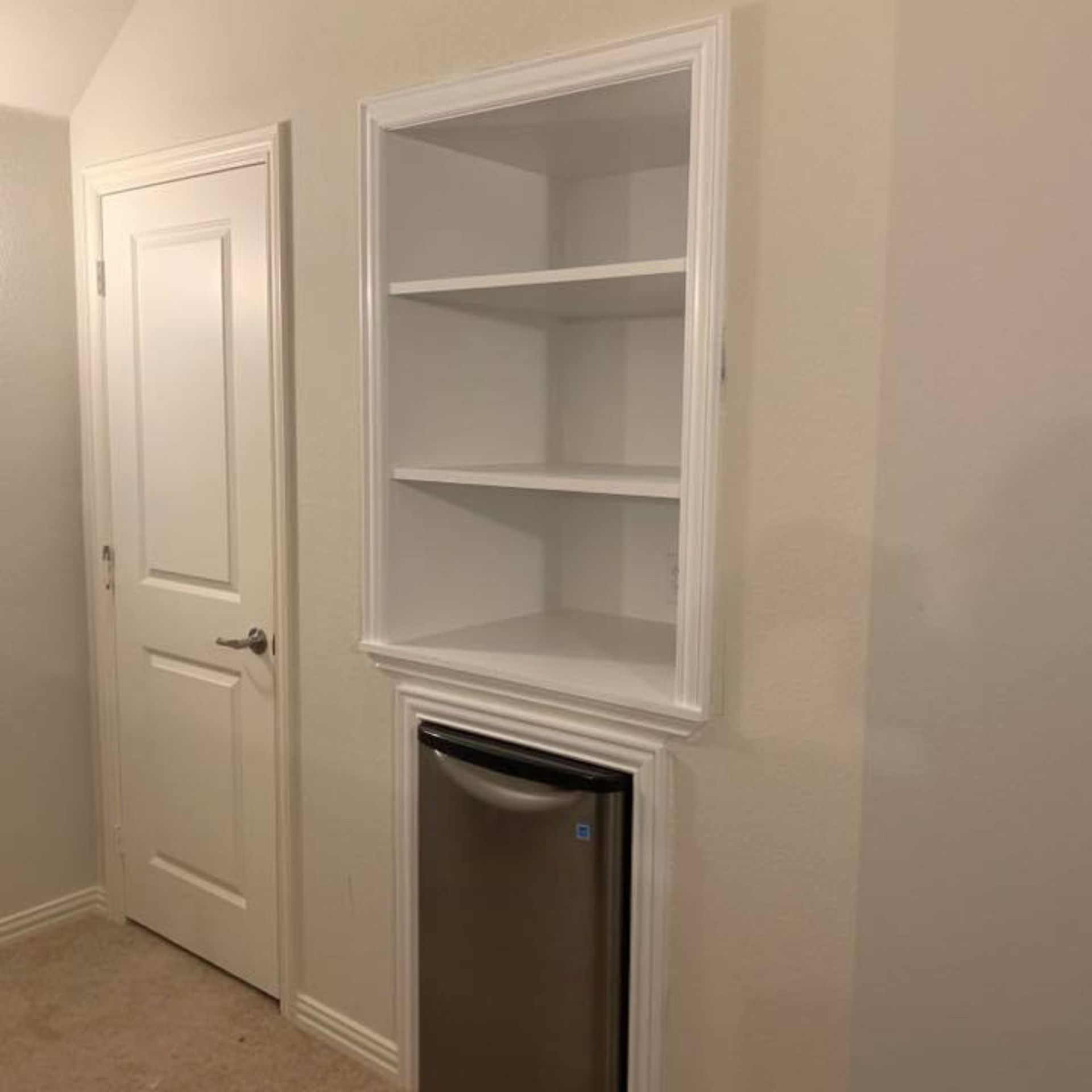 Masters Touch Roofing - There is a stainless steel dishwasher in the corner of the room.
