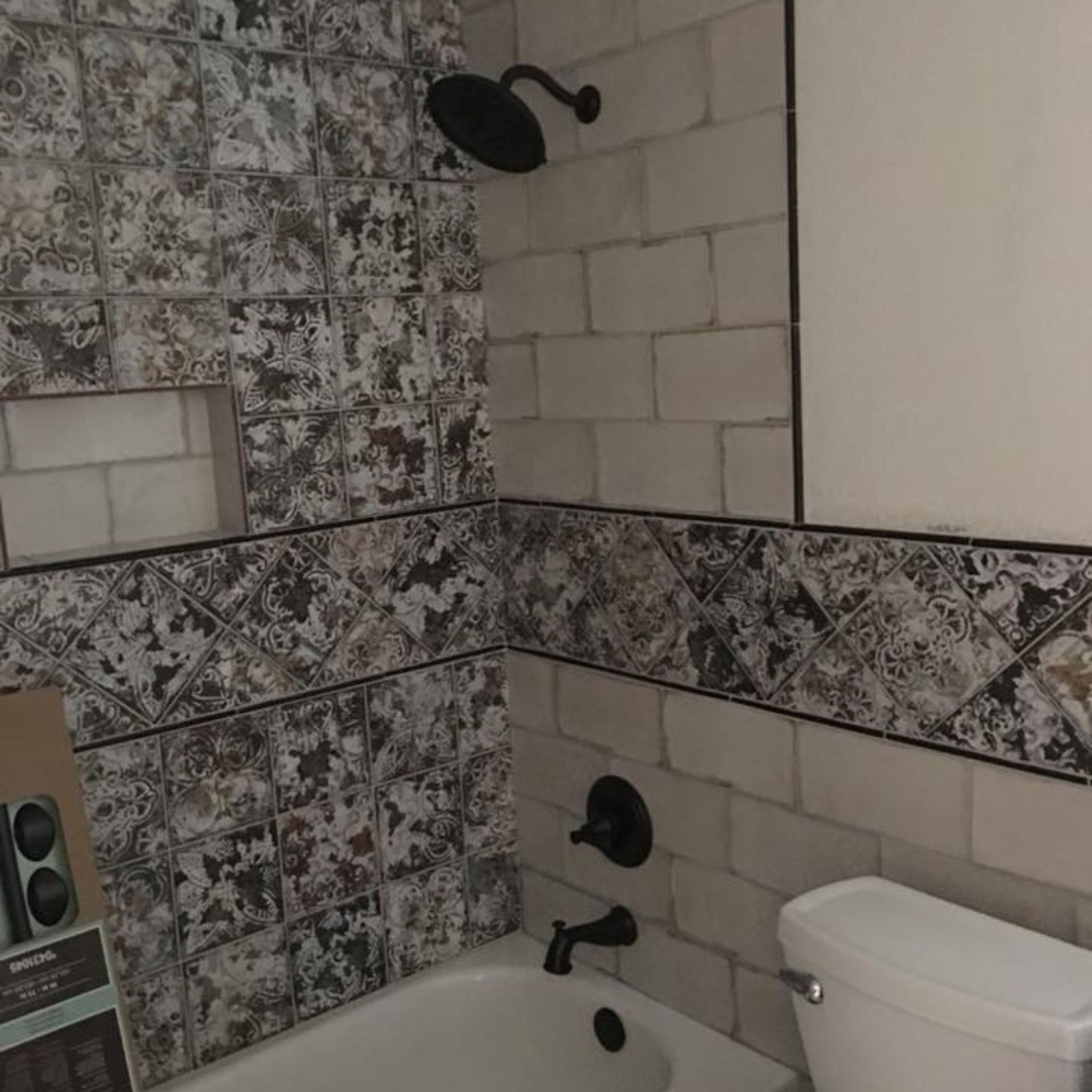 Masters Touch Roofing - A bathroom with a bathtub a toilet and a shower head