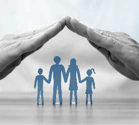Hands cupped over a paper cutout of a family, symbolizing protection and care.