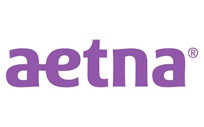 Purple Aetna logo on a white background.