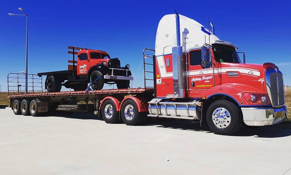 A Red Trailer Truck Loaded Another Truck | Swan Hill, Vic | Pickering Transport Group