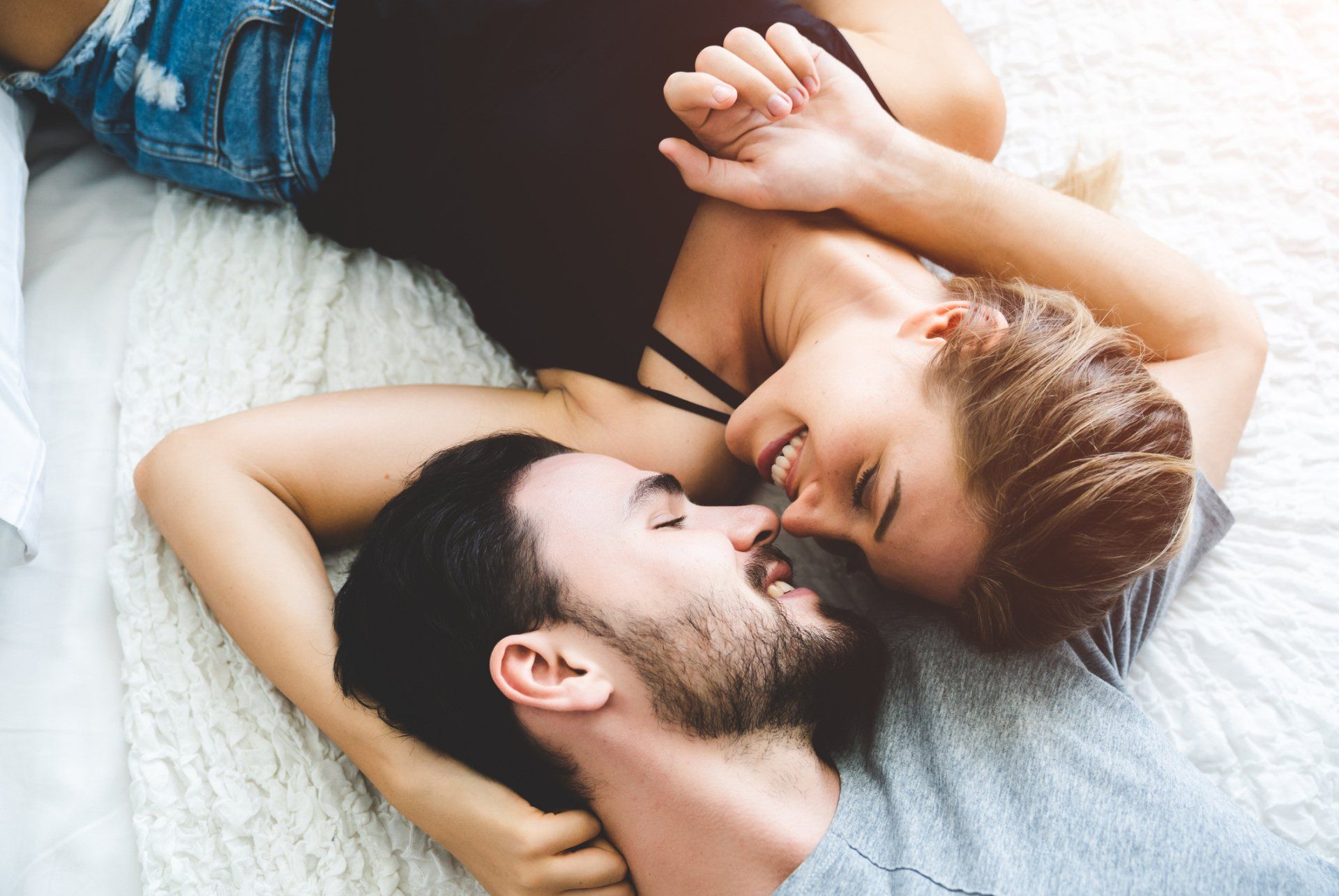 Two Couple Desire Lying on Bed - Manasquan, NJ - Mirelle Institute for Anti-Aging Medicine