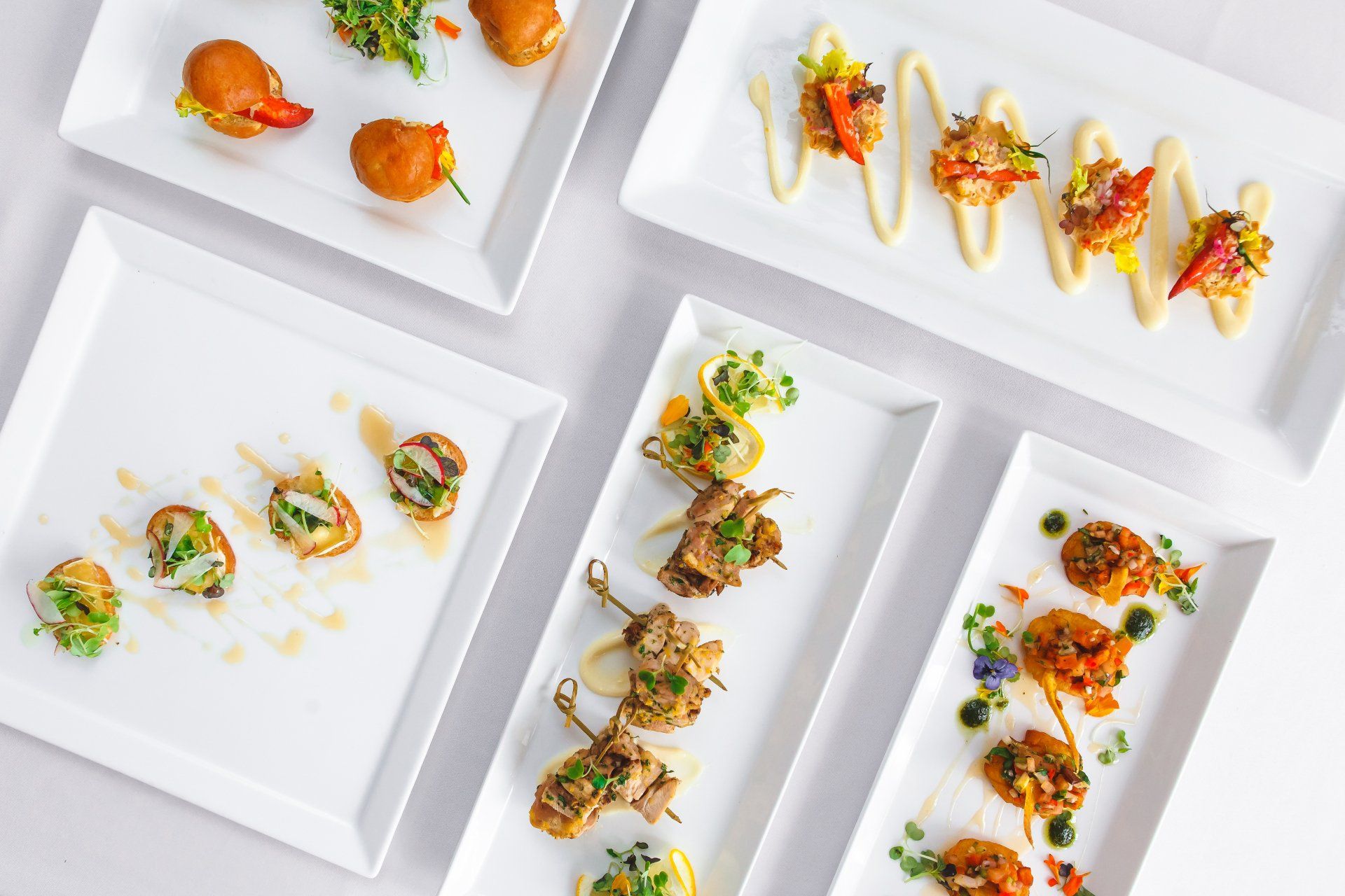 There are many different types of food on the plates.