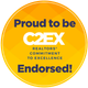 Yellow circular REOEX badge reading “Proud to be Endorsed! REALTORS Commitment to Excellence”