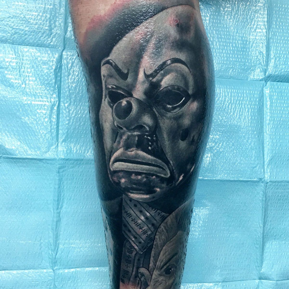 scary joker tattoo