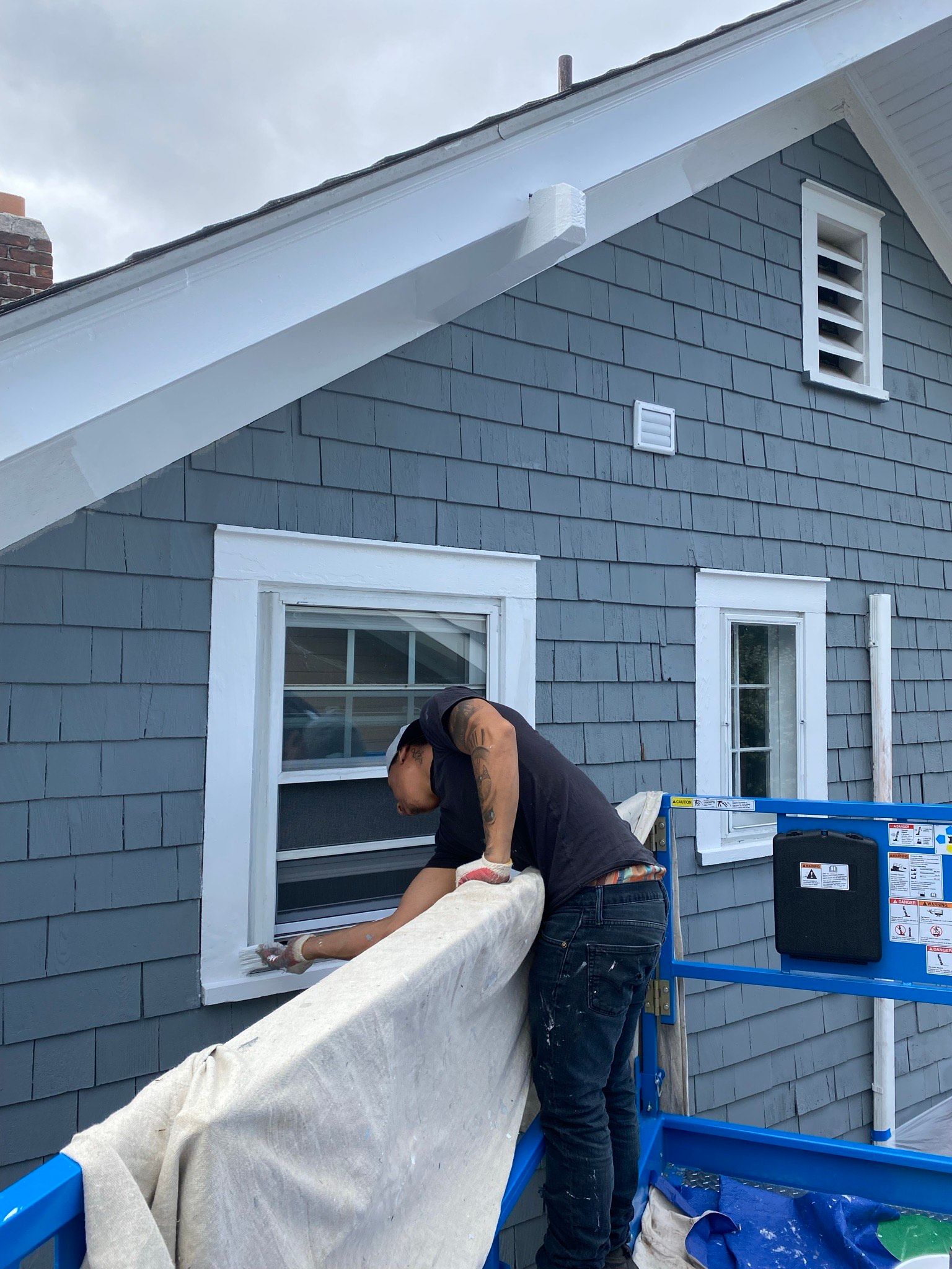 Man Painting Window – Fishkill, NY – Mandia & Sons Construction