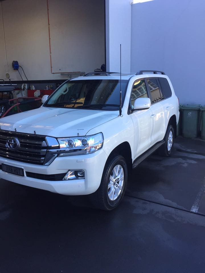 A White Toyota Land Cruiser Is Parked In Front Of A Building — Browns Autobahn In Nambour, QLD