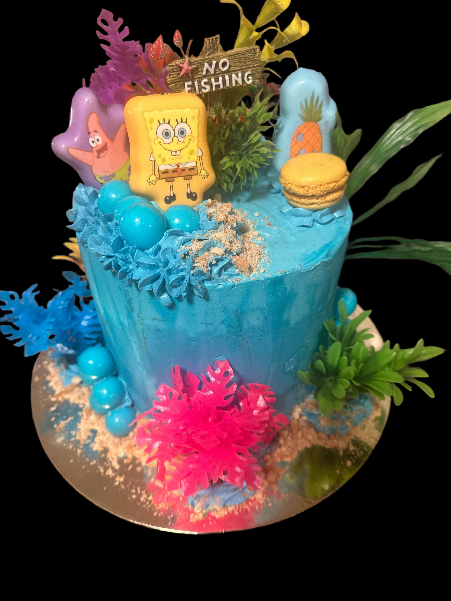 A blue cake with Spongebob Theme