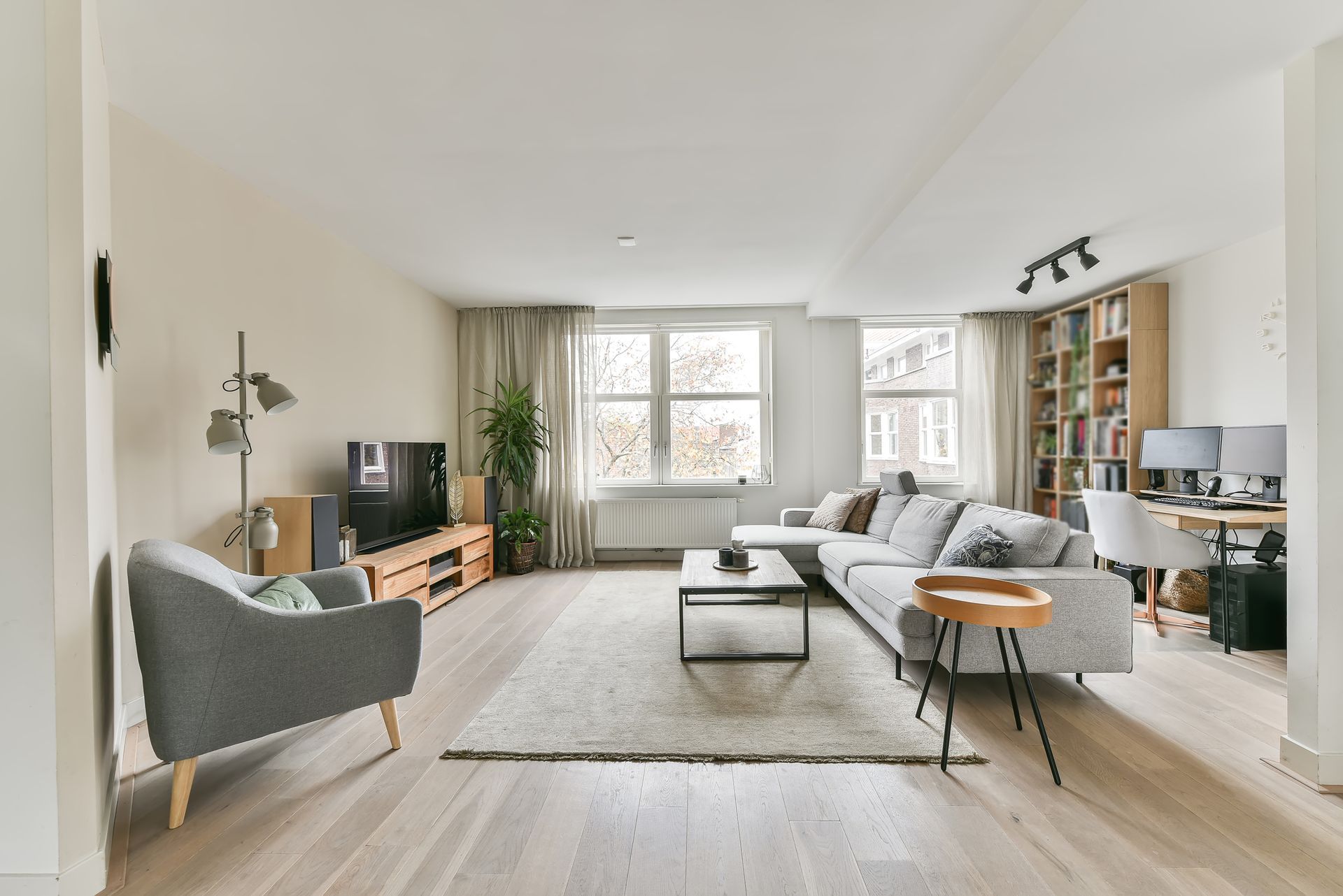 Stock photo of a living room with plenty of open space and natural lighting