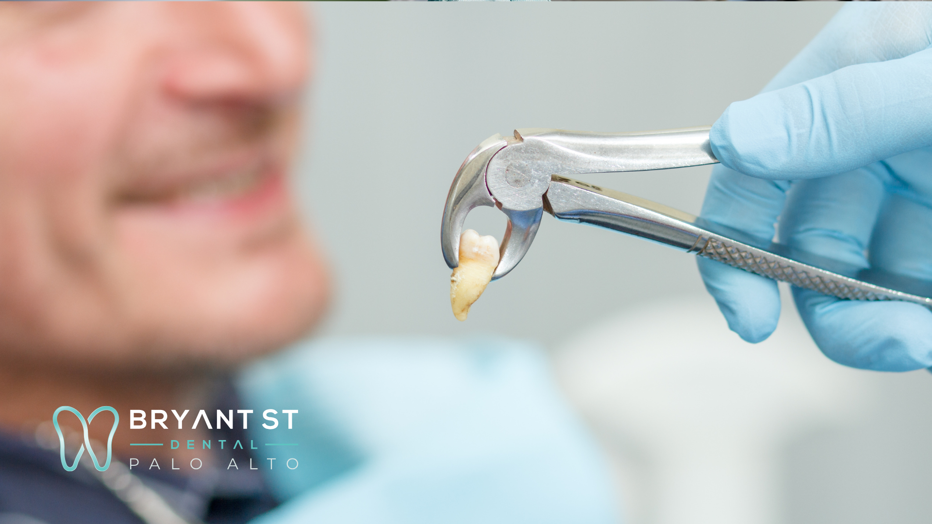 A dentist is extracting a tooth from a patient 's mouth.