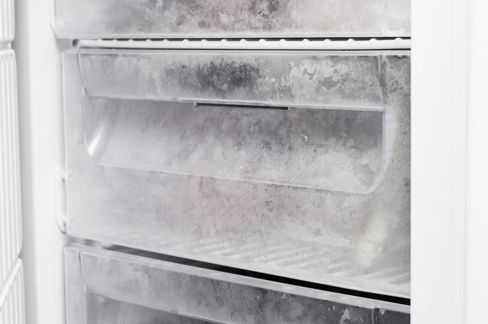 A Close-up View of Clear Plastic Freezer Drawers Inside a White Appliance — Cool Blue Ice & Water in Dubbo, NSW