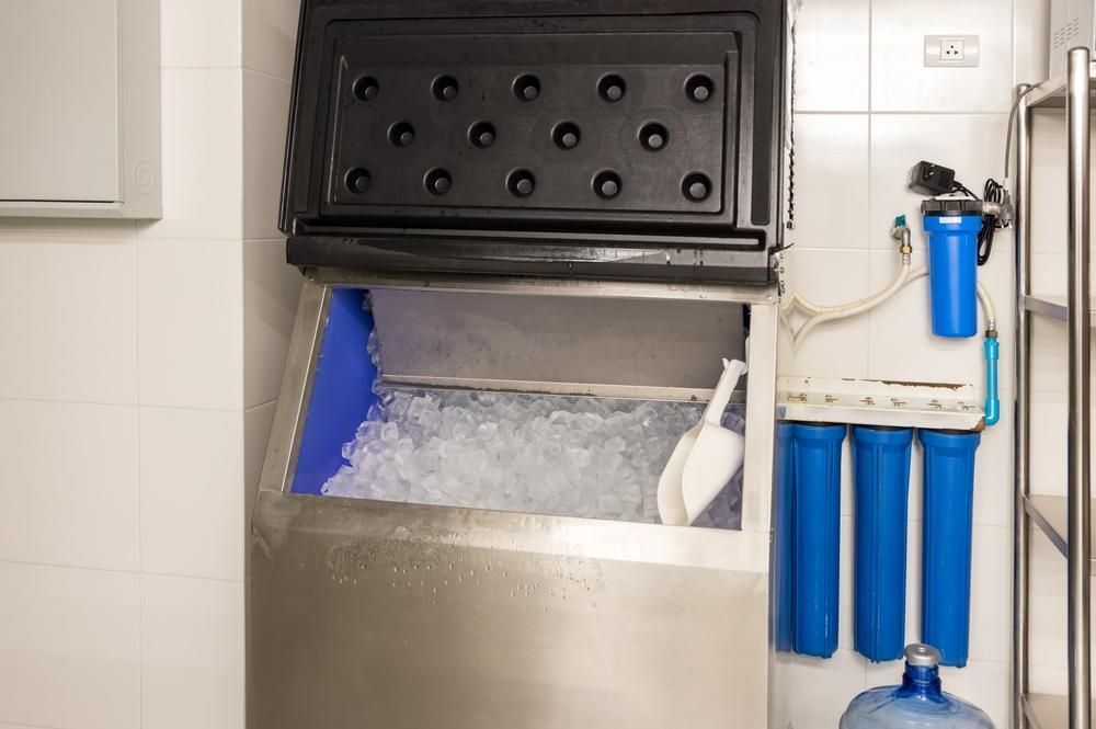 A Commercial Ice Machine With an Open Bin Full of Ice — Cool Blue Ice & Water in Coolah, NSW