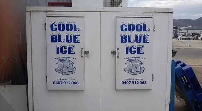 A White Commercial Ice Freezer With Two Doors, Featuring Blue Cool Blue Ice Branding — Cool Blue Ice & Water in Armidale, NSW