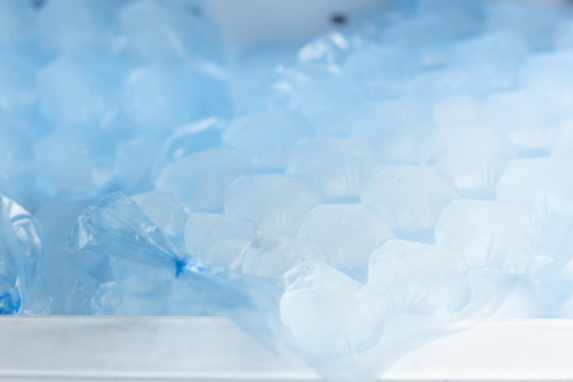 A Pile of Translucent, Light Blue Plastic Bubble Wrap Texture Fills the Frame — Cool Blue Ice & Water in Dubbo, NSW