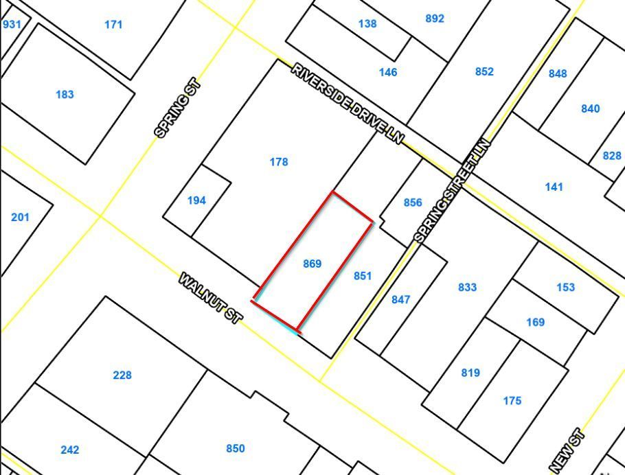 Cadastral parcel map with outlined property lots and street labels, one lot highlighted in red.