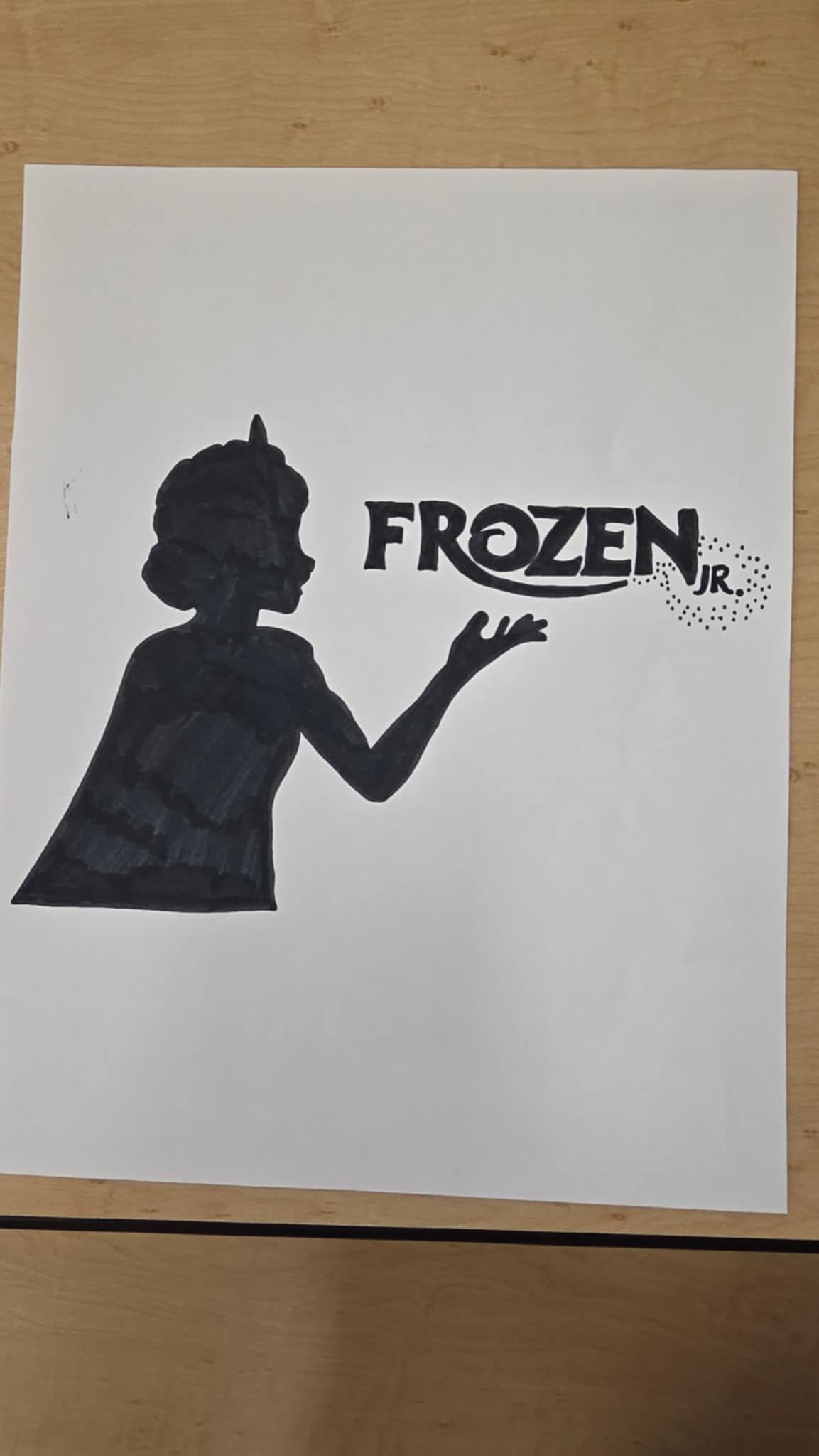Silhouette of a girl with raised hand and the text
