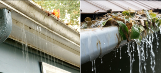 Leaves clogging a white gutter as water spills over the edge