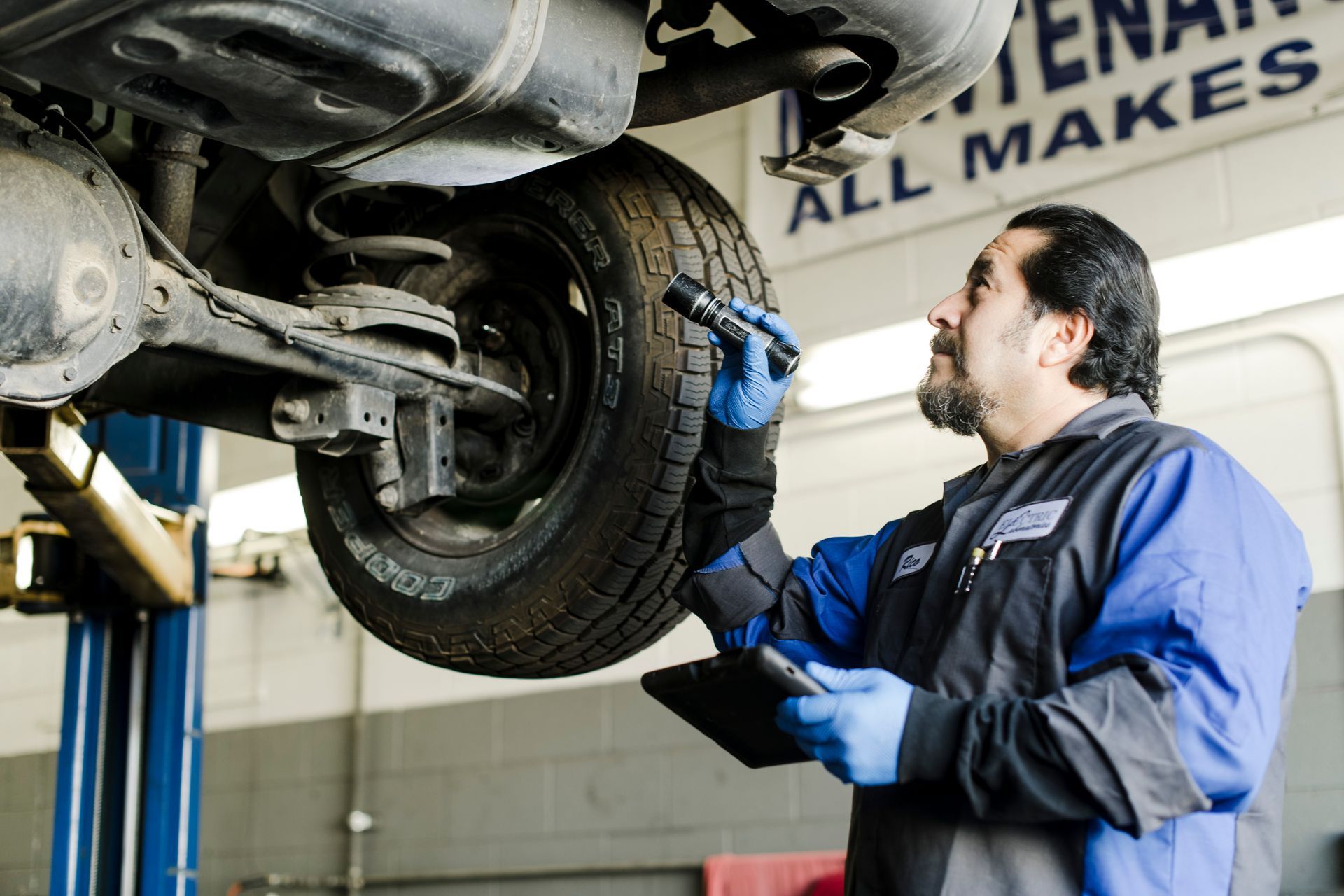 Our Mechanic is Checking Vehicle in Fresno, CA - Electric Laboratories Complete Car Care
