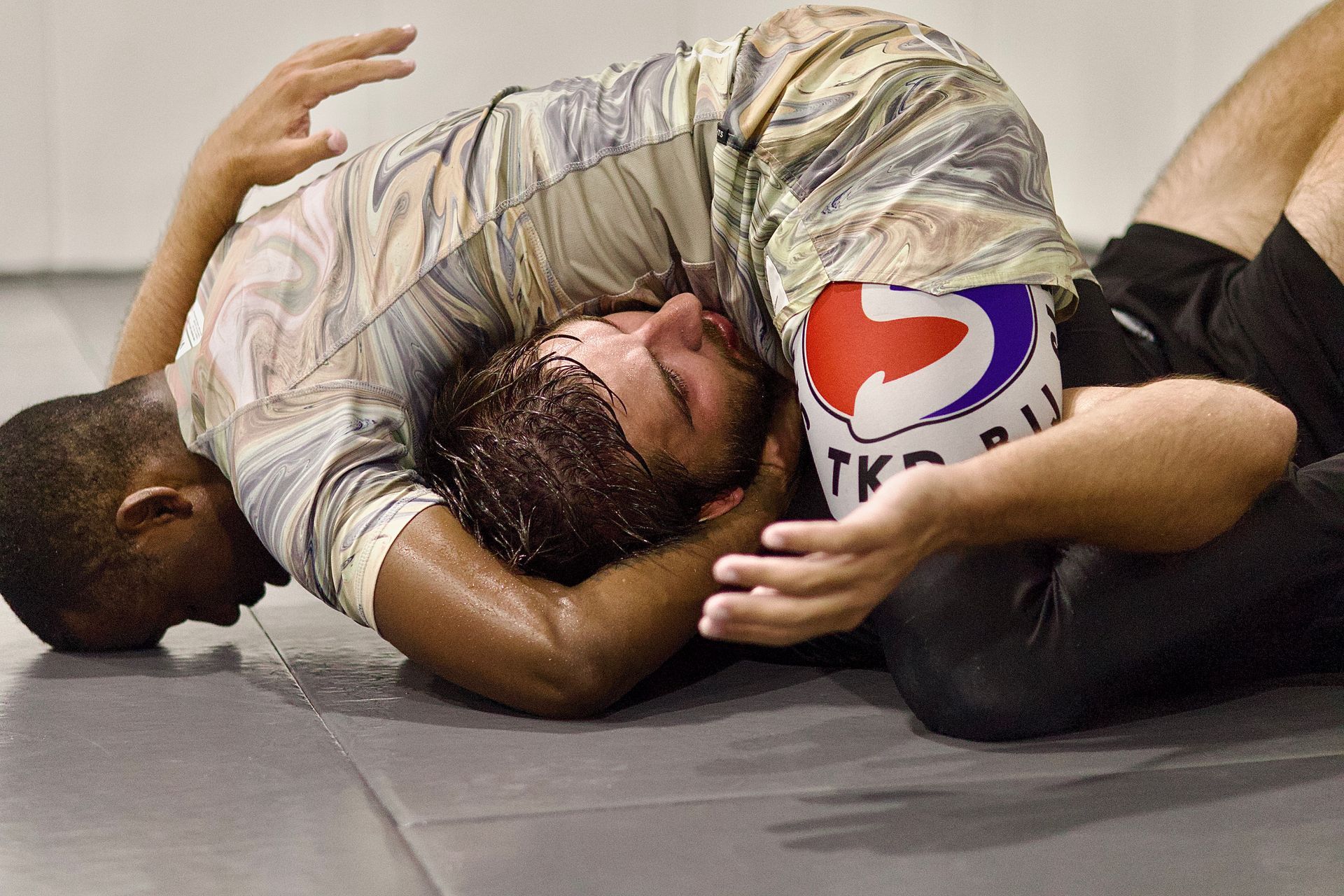 Adults training Brazilian Jiu-Jitsu at Jiu-Jitsu Modern in North Babylon, NY, building fitness and confidence.