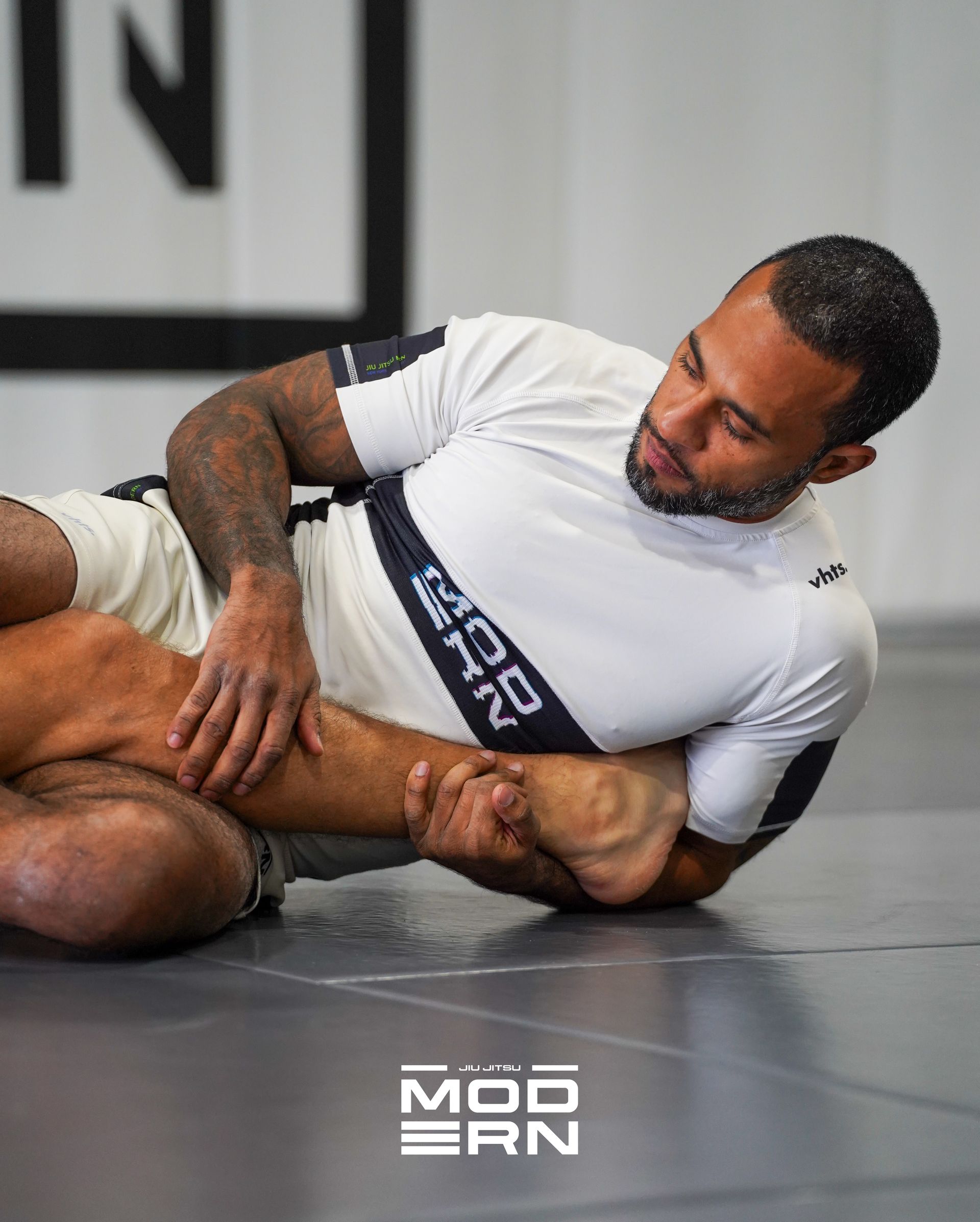 Adults drilling Brazilian Jiu-Jitsu techniques at Jiu-Jitsu Modern in North Babylon, NY.