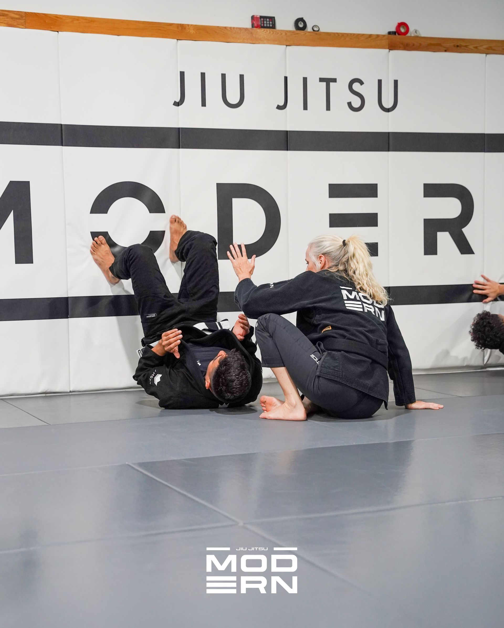 Adults drilling Brazilian Jiu-Jitsu techniques at Jiu-Jitsu Modern in North Babylon, NY.