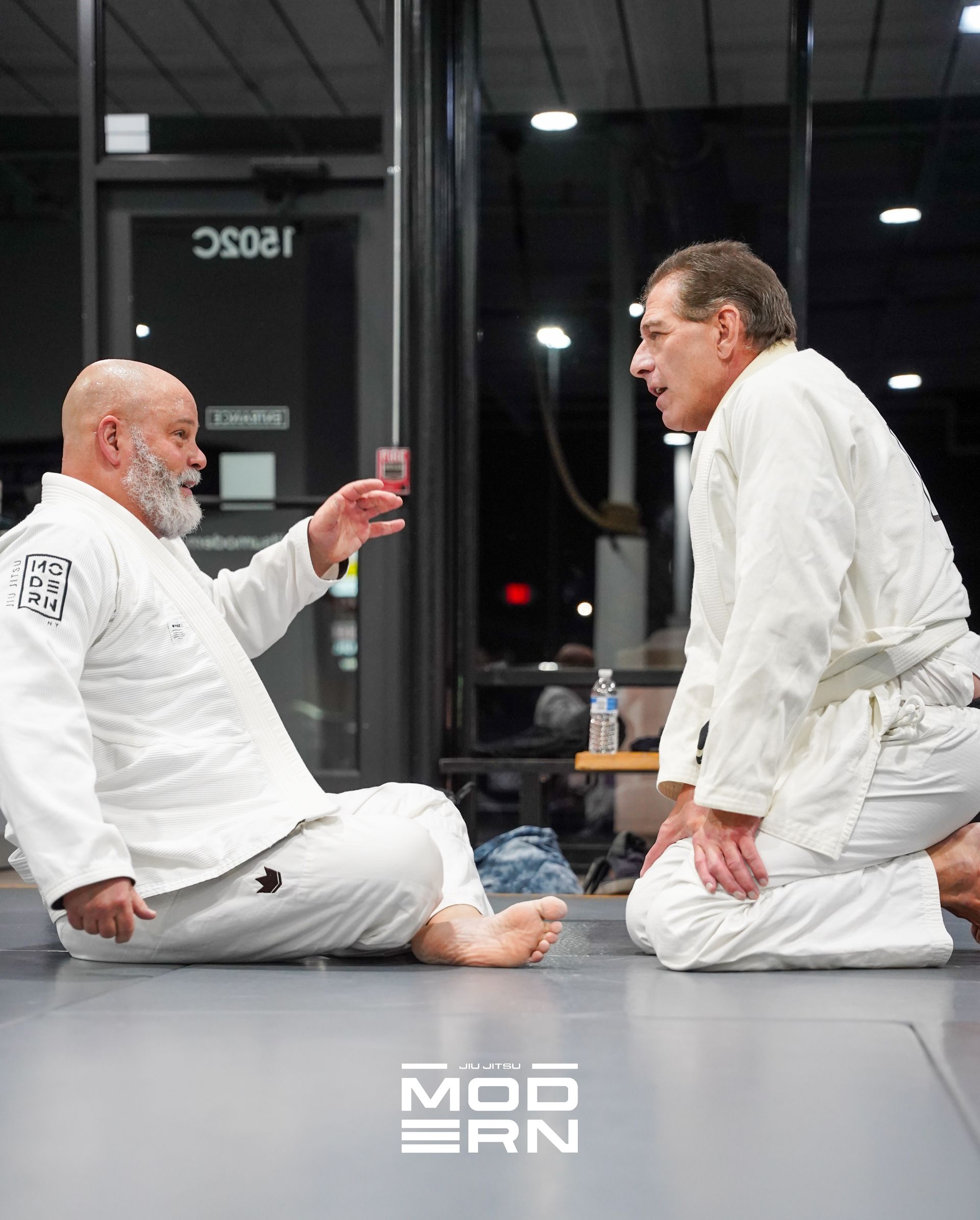 Adult students drilling beginner Brazilian Jiu-Jitsu positions at Jiu-Jitsu Modern in North Babylon