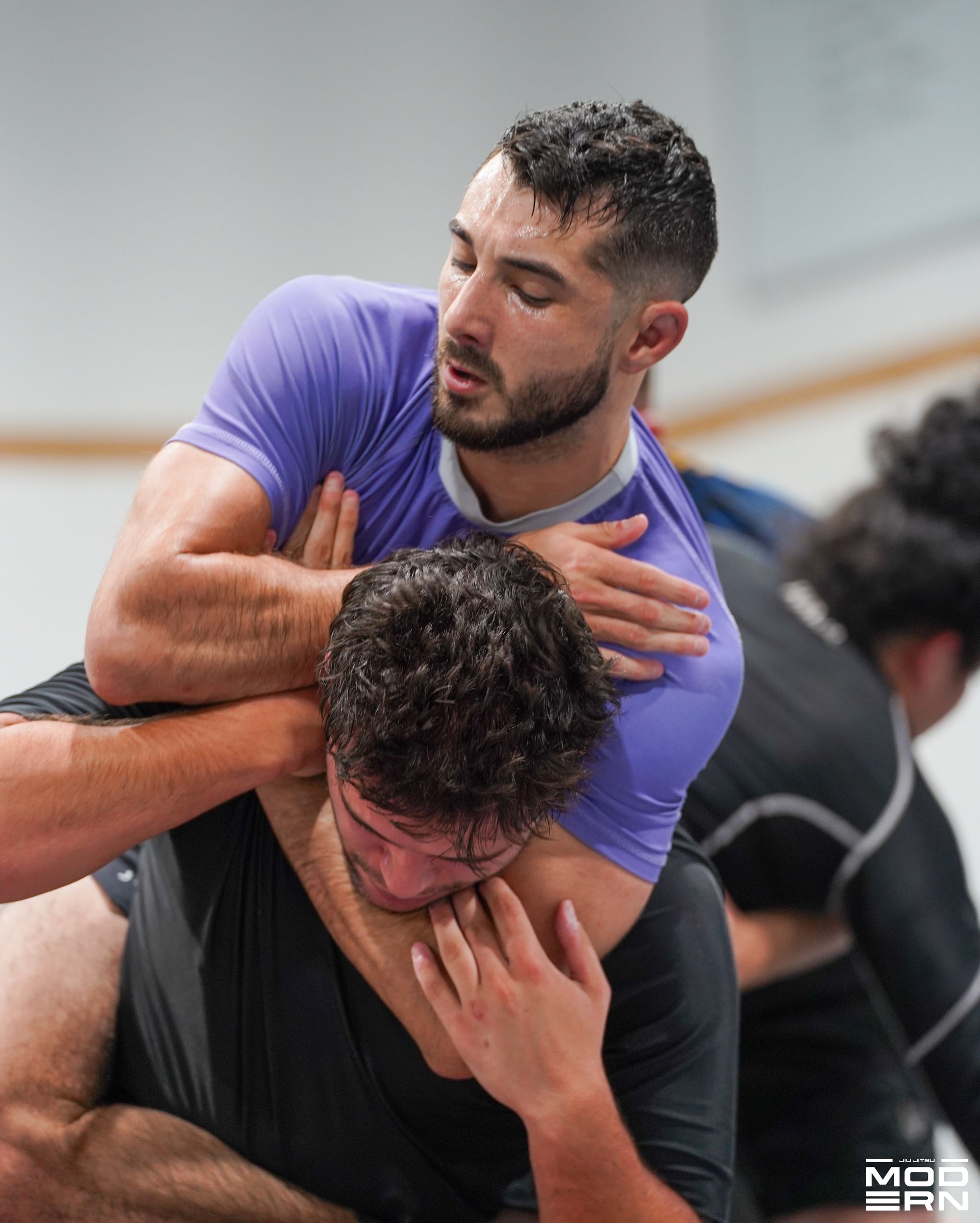 Adults drilling Brazilian Jiu-Jitsu at Jiu-Jitsu Modern in North Babylon, NY, building daily energy.