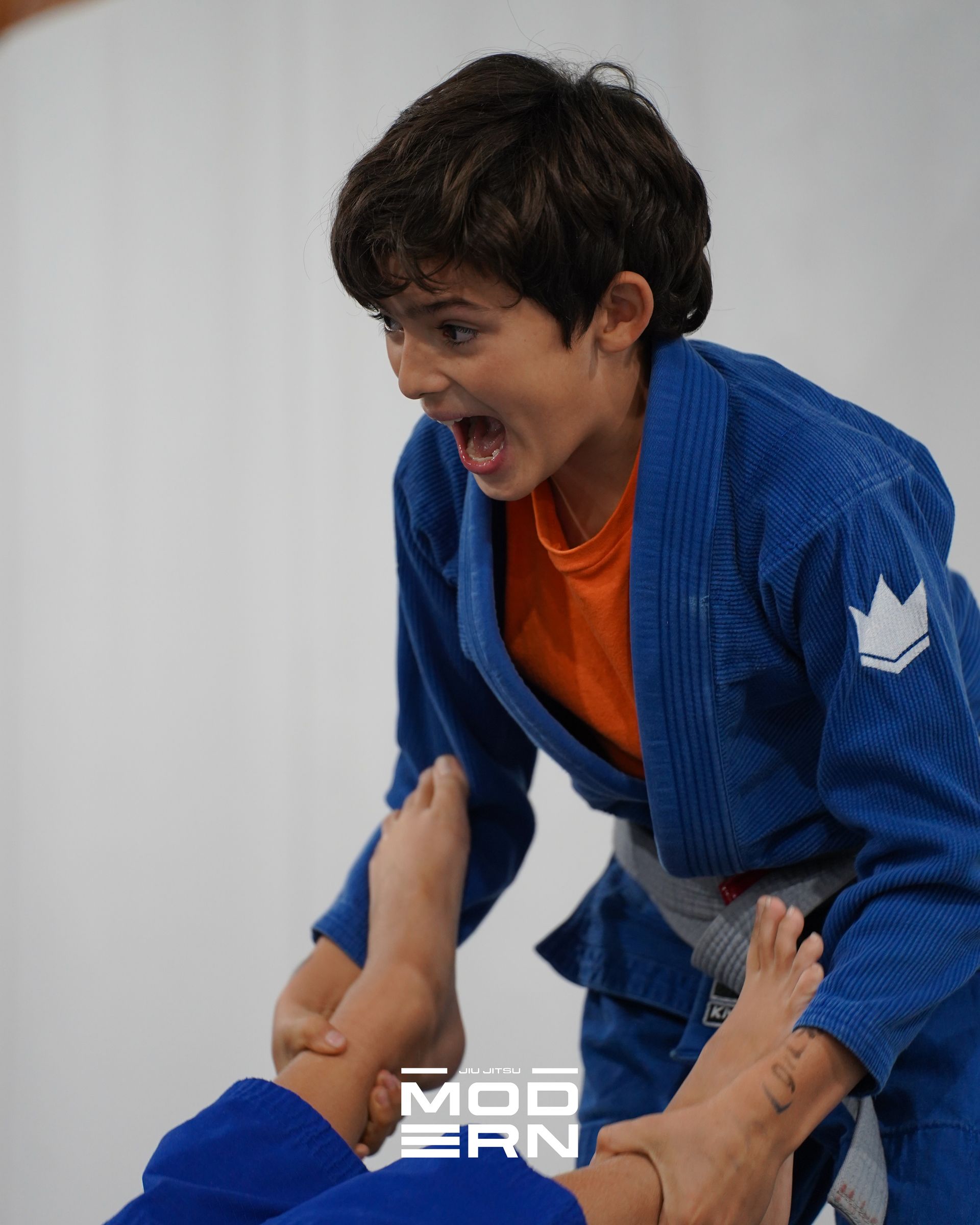 Kids training Brazilian Jiu-Jitsu at Jiu-Jitsu Modern in North Babylon, NY, building confidence.