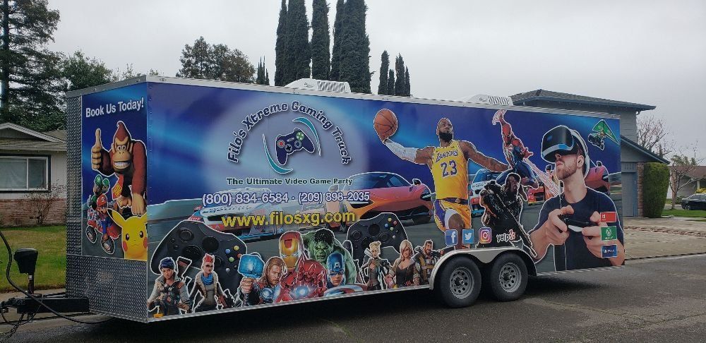 A gaming trailer with colorful graphics featuring characters, LeBron James, and virtual reality.