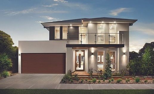 A Modern House With a Large Garage and a Balcony — The Roller Door Man NQ In Redlynch, QLD