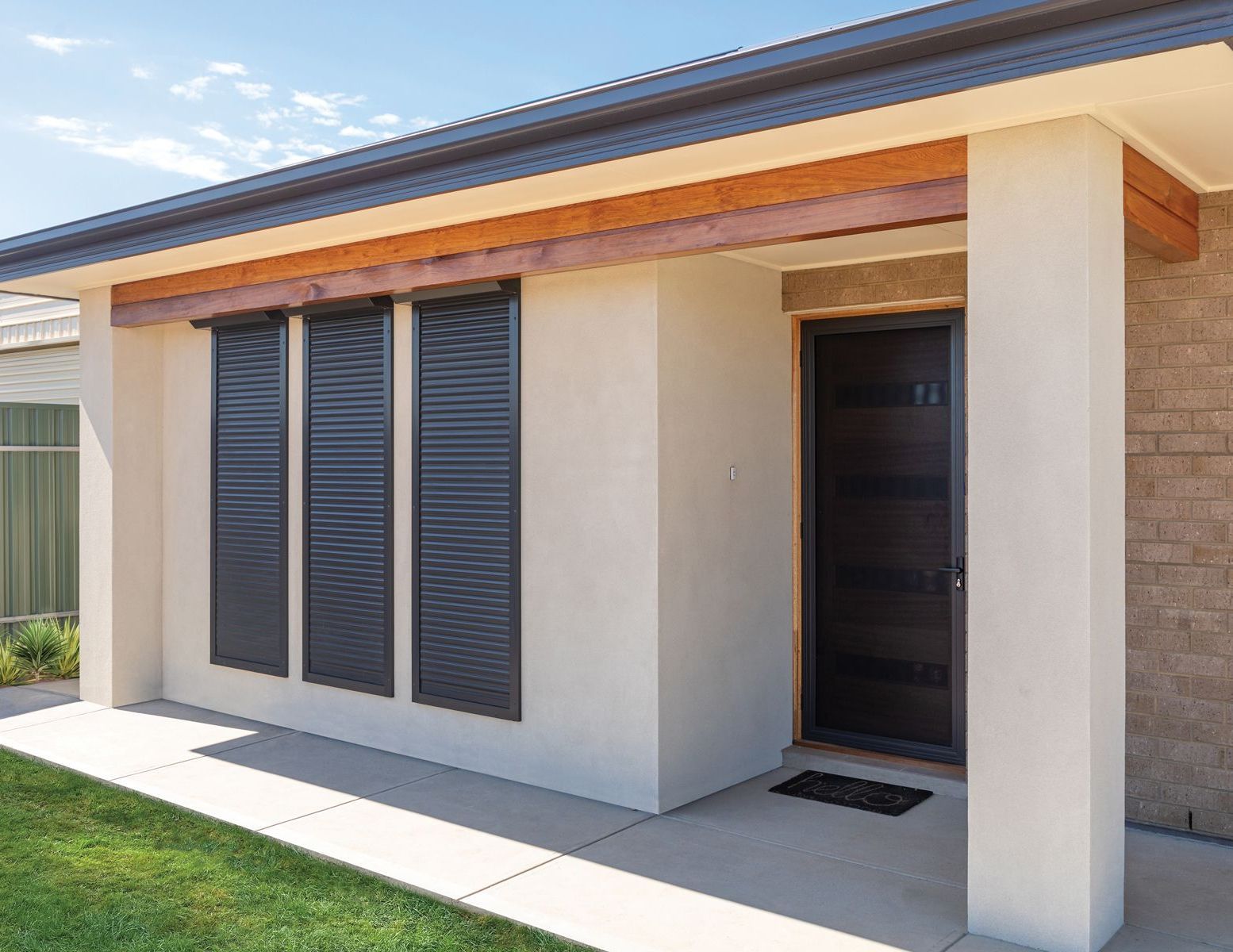 A House With 2 Roller Shutters — The Roller Door Man NQ In Portsmith, QLD