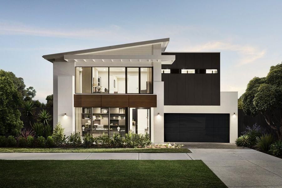 A Modern House With A Black Garage Door And A Lot Of Windows — The Roller Door Man NQ In Innisfail, QLD