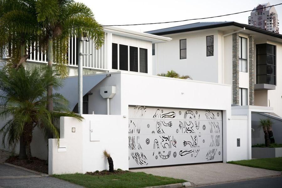 A White House With A White Garage Door With A Pattern — The Roller Door Man NQ In Portsmith, QLD