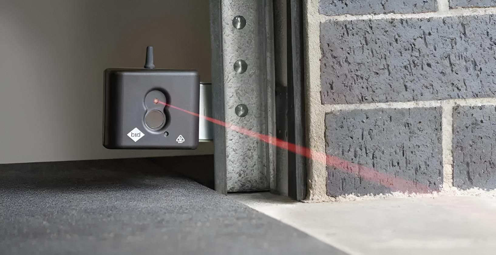 A Door With A Laser Beam Coming Out Of It — The Roller Door Man NQ In Portsmith, QLD
