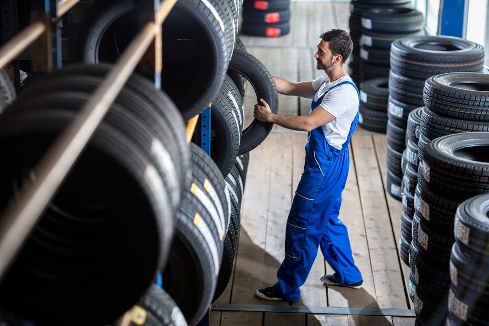 Auto Mechanic Choose Tire For Car — Tyre Service in Blackall Tambo, QLD