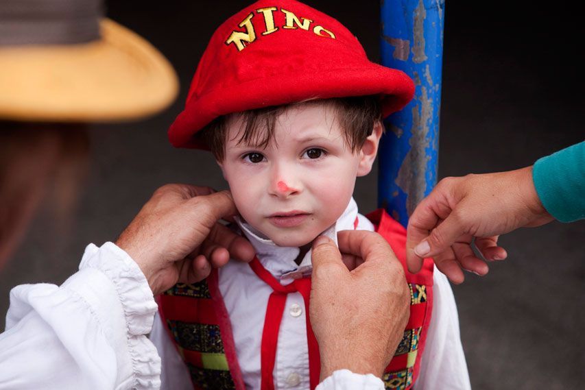 Nino and his sister, Tosca, make final adjustments to Julien's costume before he goes into the ring with his father, Nino.