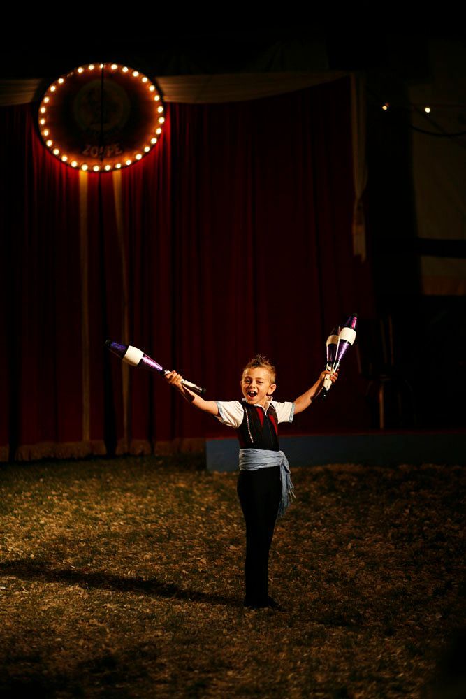 Adrian Poema Jr. encourages the audience to clap after completing a particularly difficult juggling trick.