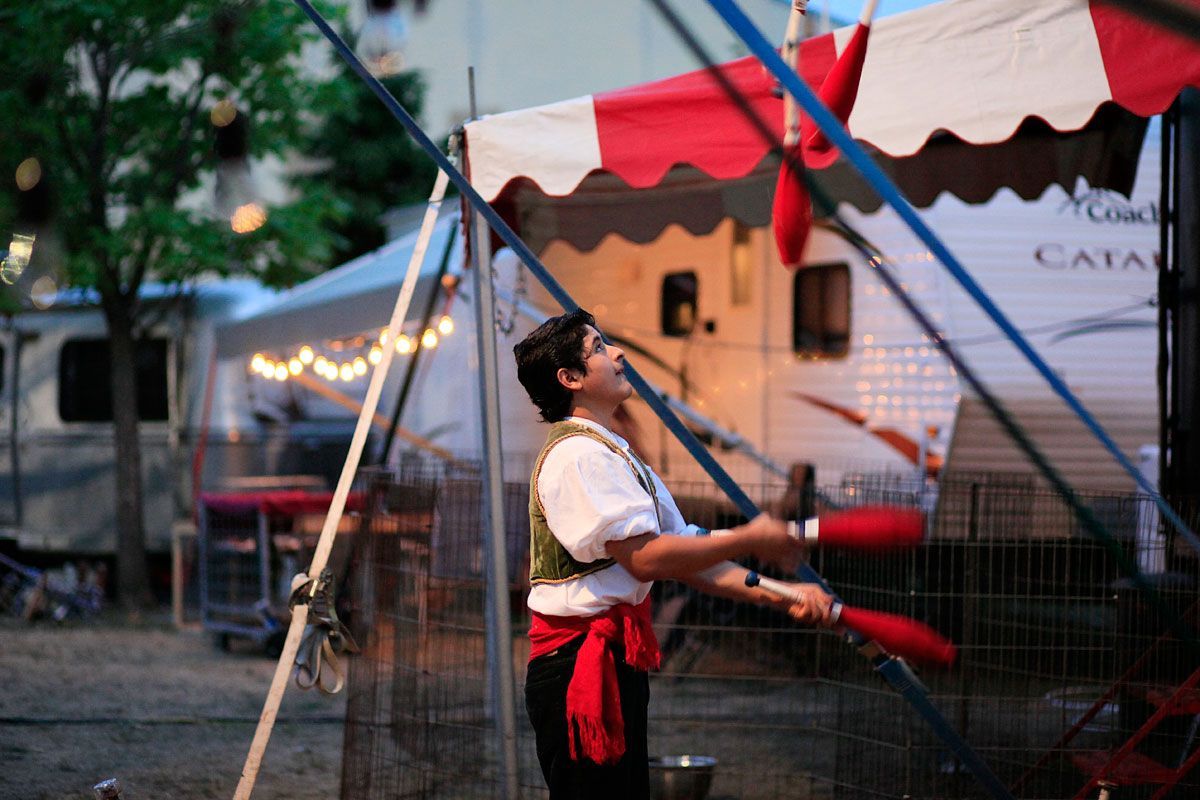 Juggling practice behind the scenes at the Zoppé Family Circus.