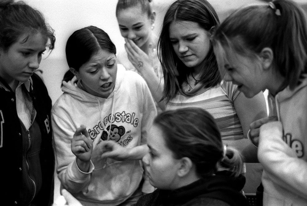 'She [the girl sitting down] was talking about me, and Summer wanted to be in [the argument] too and everyone wanted to be in it, too.' -- Bobbi Ousley (far left), 13.