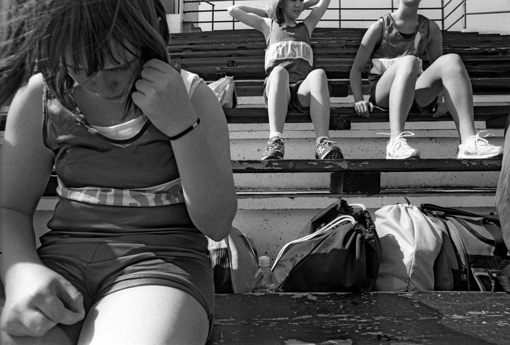 'I enjoy track, it's a fun competitive sport and you learn a lot about yourself. I think track is a very good sport to play because everyone is nice and you don't have to worry about anybody being mean or pushy. It's all about doing your best, that's why I love the sport. But that day I had to run the 400 and I felt sick so I was crying.' --Lacie Norris, 13.