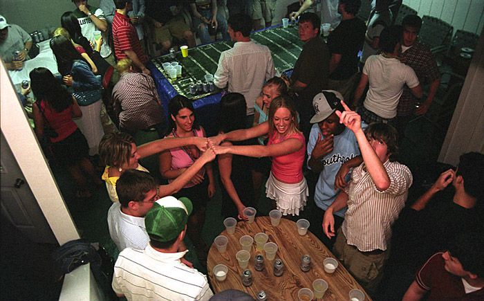 Members of various Greek organizations play flip cup (foreground) and beer pong (background) at the Delta Upsilon party barn. 'Well frat life...I don't know if it's a culture or a subculture,' says Jim Velleta. 'I look at it as an organization that’s part of OU that helps OU through philanthropic events. But I think those things get overshadowed by the parties, or the secrecy and rituals and secret handshakes.'